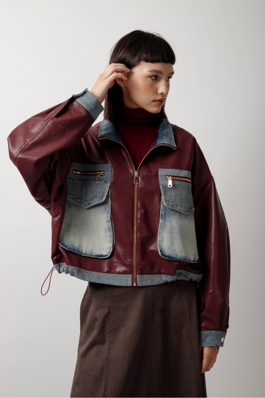 LEATHER JACKET WITH JEANS DETAILS