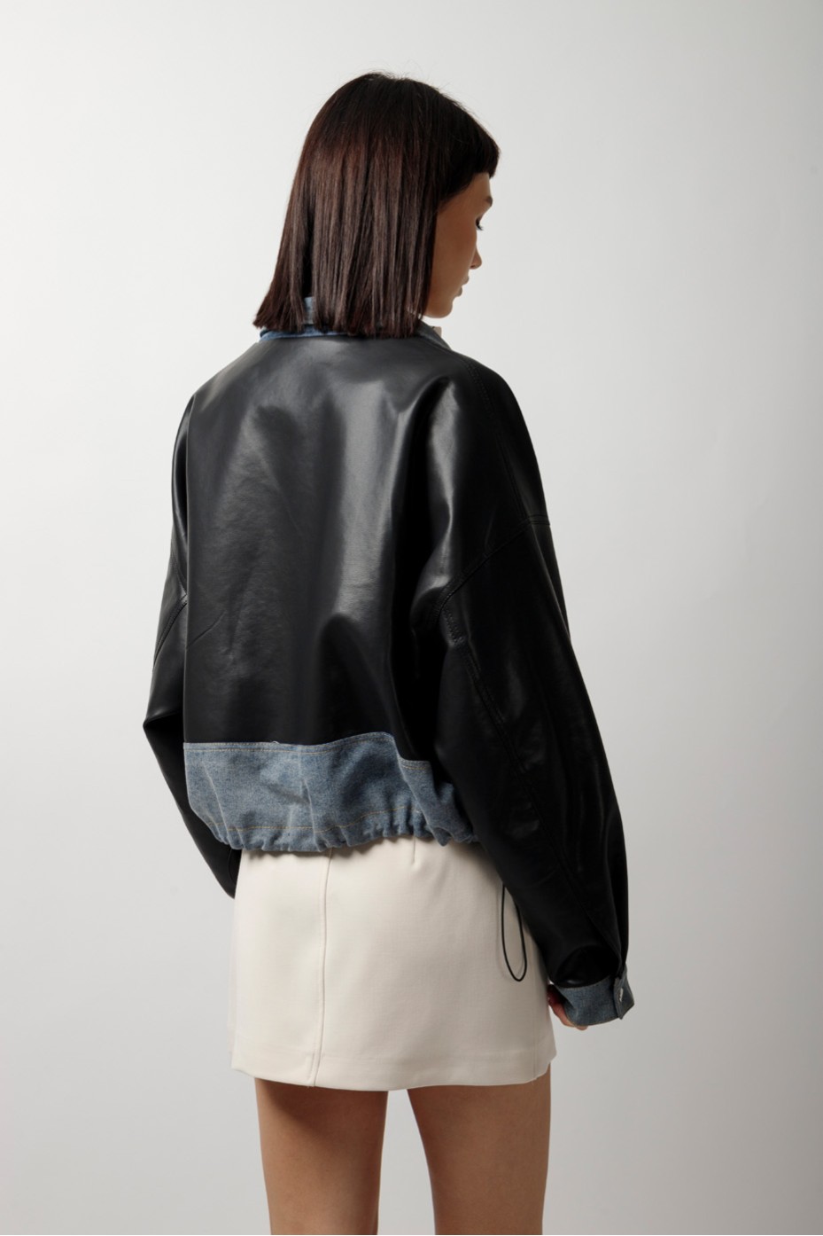LEATHER JACKET WITH JEANS DETAILS