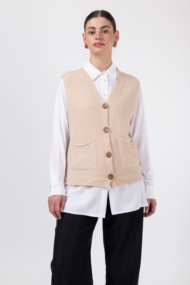 Sleeveless cardigan with buttons.