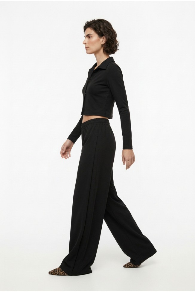 FLARED PANTS WITH SIDE PUT-OUT