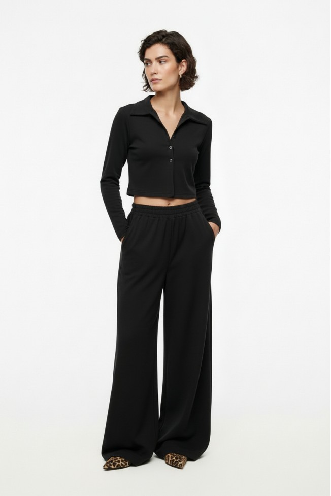 FLARED PANTS WITH SIDE PUT-OUT