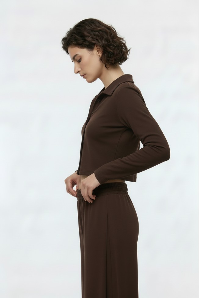 FLARED PANTS WITH SIDE PUT-OUT