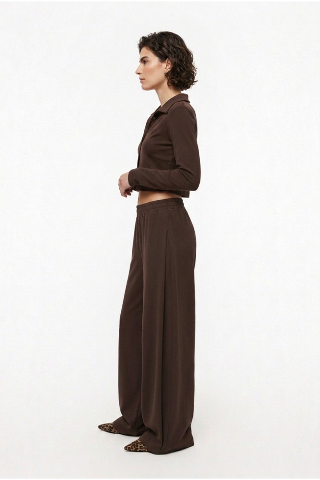 FLARED PANTS WITH SIDE PUT-OUT