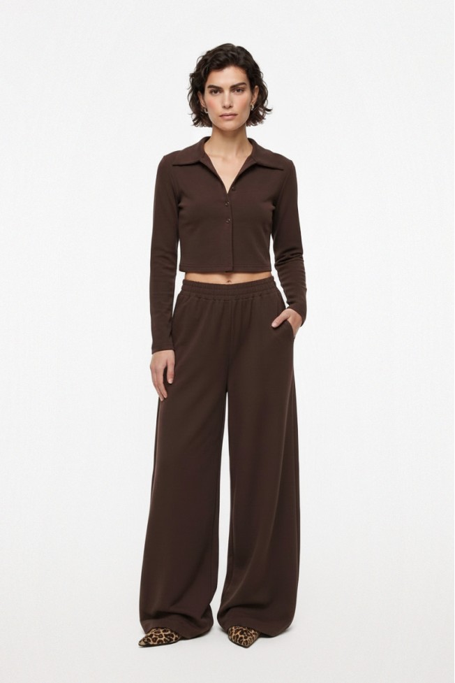 FLARED PANTS WITH SIDE PUT-OUT